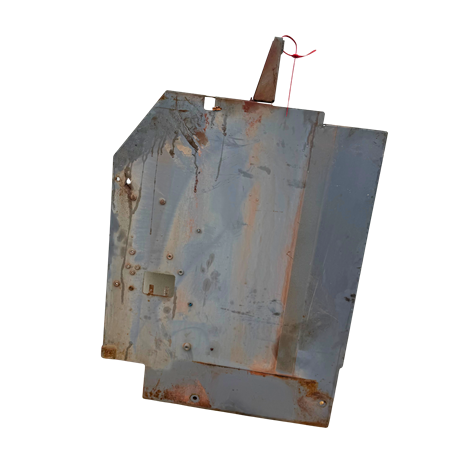 Täckplåt mot motvikt vänster